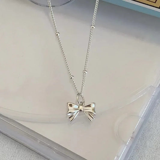 Atelier22 Metal Bow Necklace